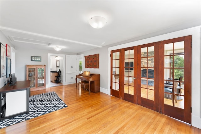 80 Highland Ave, South Kingstown, RI 02879 - entryway with french doors and hardwood / wood-style floors