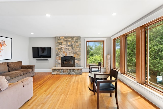 80 Highland Ave, South Kingstown, RI 02879 - living area with light wood-type flooring, a fireplace, and recessed lighting