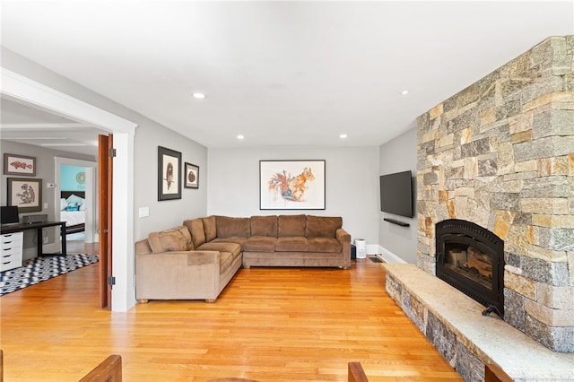 80 Highland Ave, South Kingstown, RI 02879 - living area with light wood finished floors, recessed lighting, and a fireplace