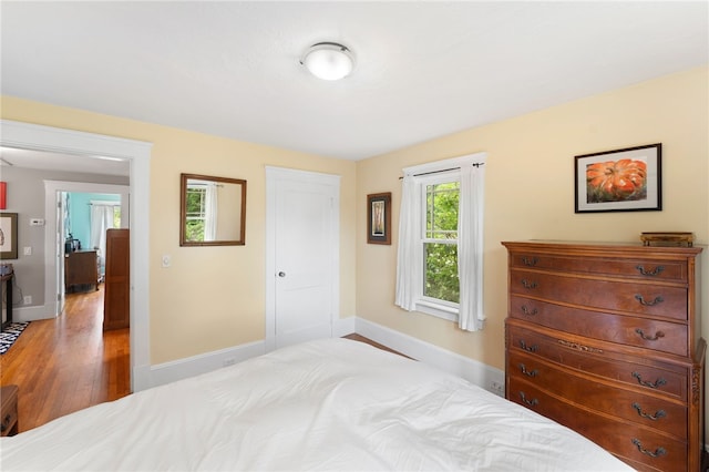 80 Highland Ave, South Kingstown, RI 02879 - bedroom featuring baseboards and light wood finished floors