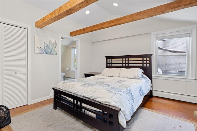 92 Franklin St, Bristol, RI 02809 - bedroom featuring a baseboard radiator, beamed ceiling, wood finished floors, a closet, and recessed lighting