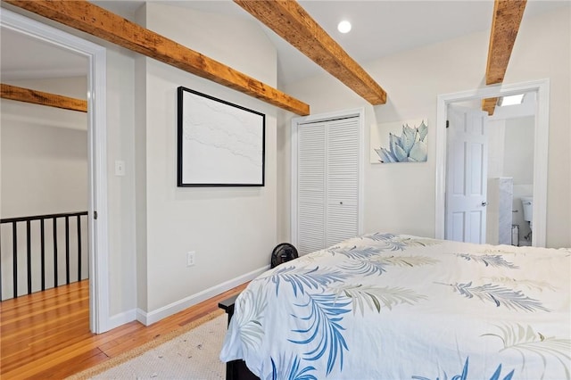 92 Franklin St, Bristol, RI 02809 - bedroom featuring beamed ceiling, wood finished floors, a closet, and recessed lighting