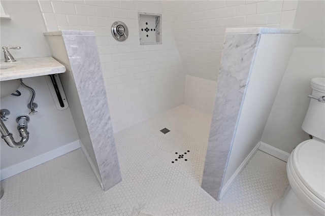 92 Franklin St, Bristol, RI 02809 - bathroom featuring tiled shower and tile patterned flooring