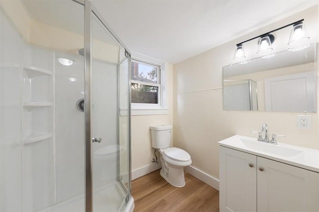 54 Harrison St, Pawtucket, RI 02860 - bathroom with wood finished floors, a stall shower, and vanity