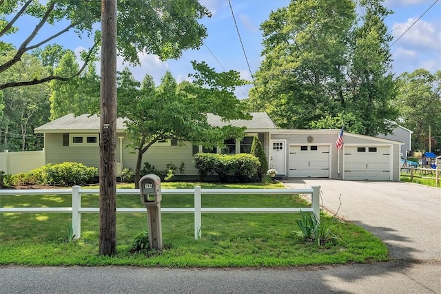 144 Hines Rd, Cumberland, RI 02864 - view of front of home with an attached garage and driveway