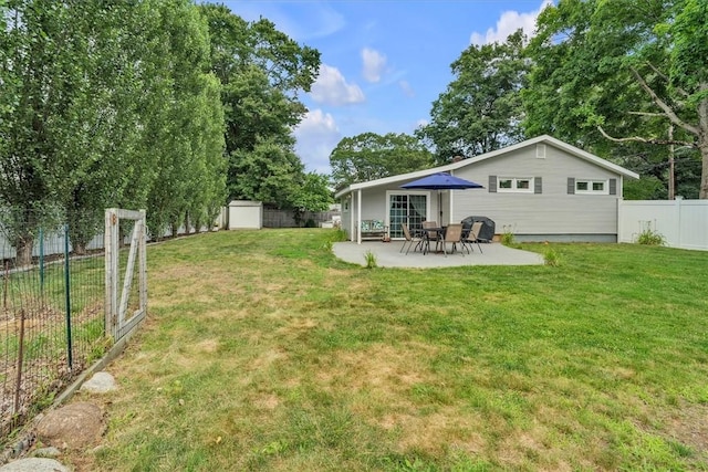 144 Hines Rd, Cumberland, RI 02864 - fenced backyard with a patio and a shed