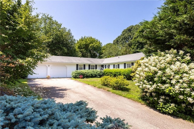 2 Quail Run, Westerly, RI 02891 - single story home with an attached garage and asphalt driveway