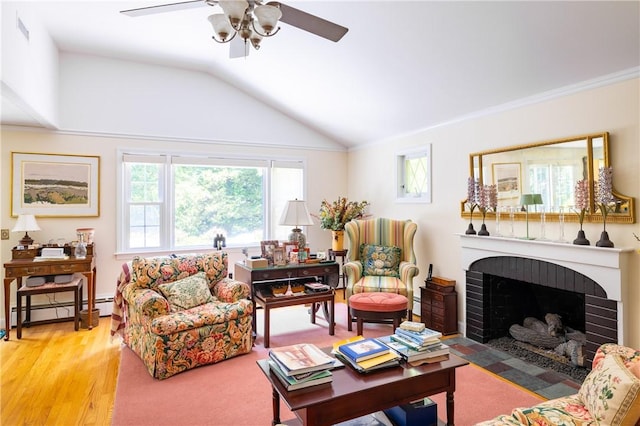 2 Quail Run, Westerly, RI 02891 - living area featuring baseboard heating, a ceiling fan, light wood-style flooring, lofted ceiling, and a brick fireplace