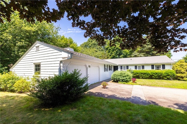 2 Quail Run, Westerly, RI 02891 - ranch-style home with driveway, a garage, and a front yard
