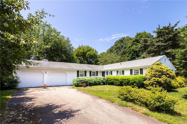 2 Quail Run, Westerly, RI 02891 - single story home featuring an attached garage and asphalt driveway