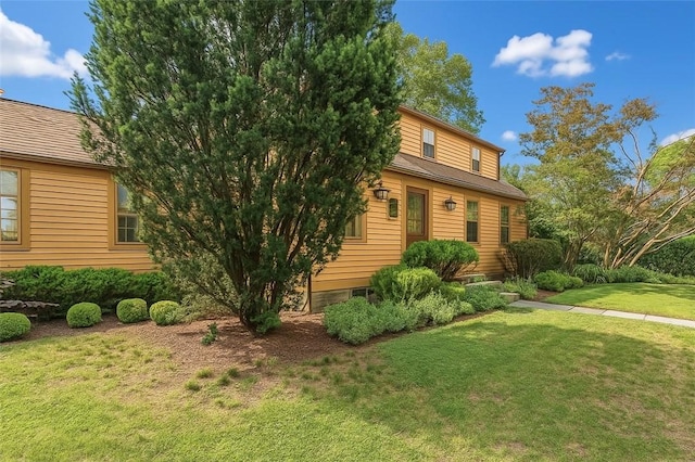 603 E Ave, Pawtucket, RI 02860 - view of front of house with a front lawn