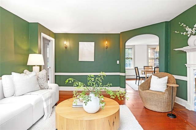 603 E Ave, Pawtucket, RI 02860 - living room featuring arched walkways and wood finished floors