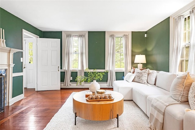 603 E Ave, Pawtucket, RI 02860 - living room with hardwood / wood-style floors and a fireplace
