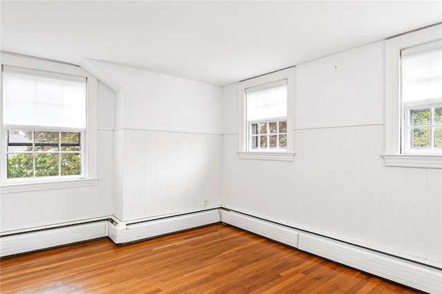 603 E Ave, Pawtucket, RI 02860 - unfurnished room with a baseboard radiator and wood finished floors