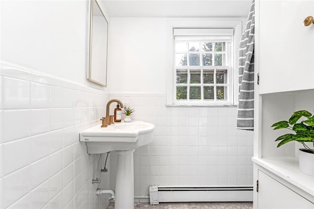 603 E Ave, Pawtucket, RI 02860 - bathroom with baseboard heating, tile walls, and wainscoting