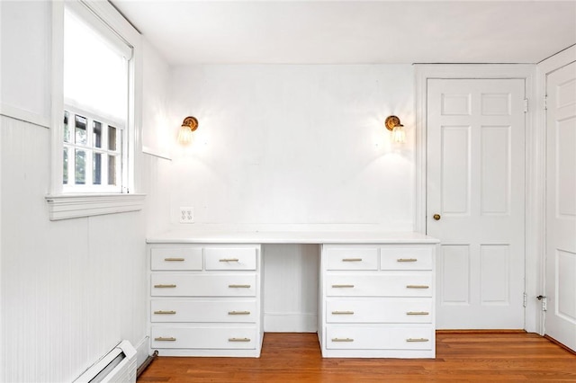 603 E Ave, Pawtucket, RI 02860 - unfurnished office featuring a baseboard radiator and wood finished floors