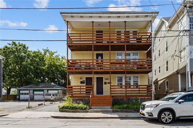289 Mowry St, Woonsocket, RI 02895 - view of front of home with a balcony and a porch