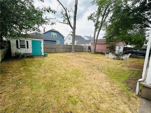 51 Benjamin St, Pawtucket, RI 02861 - fenced backyard featuring a shed