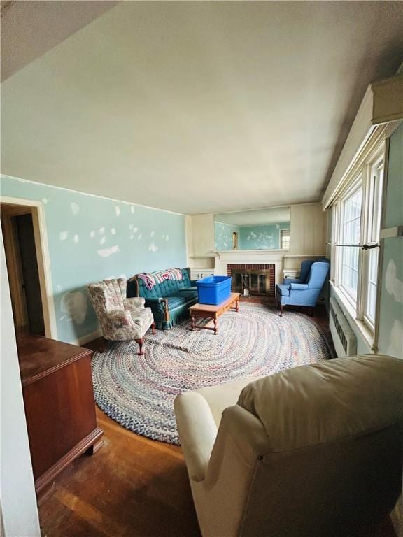 51 Benjamin St, Pawtucket, RI 02861 - living area featuring wood finished floors and a fireplace