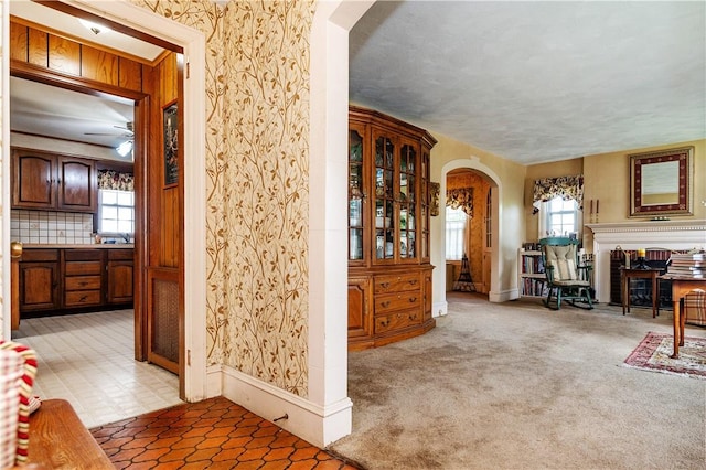 64 Riverfarm Rd, Cranston, RI 02910 - living area featuring arched walkways and wallpapered walls