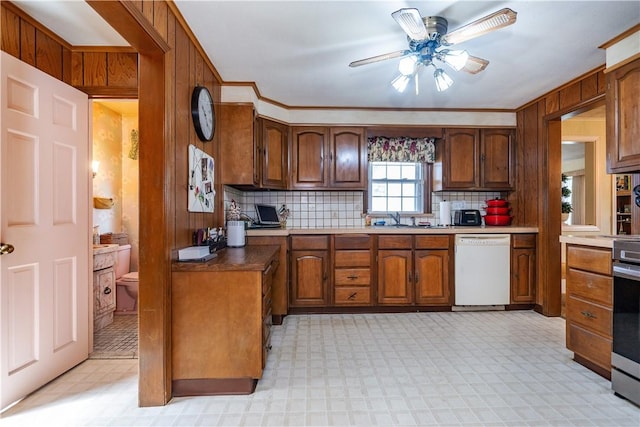 64 Riverfarm Rd, Cranston, RI 02910 - kitchen with white dishwasher, light flooring, a ceiling fan, tasteful backsplash, and crown molding