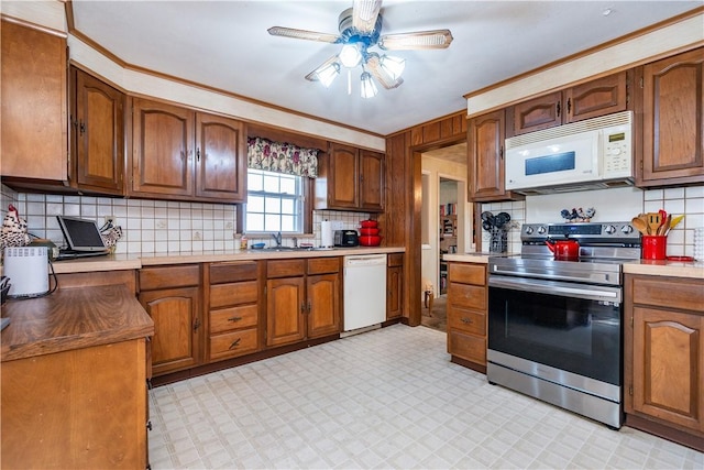 64 Riverfarm Rd, Cranston, RI 02910 - kitchen with white appliances, light flooring, a ceiling fan, backsplash, and crown molding