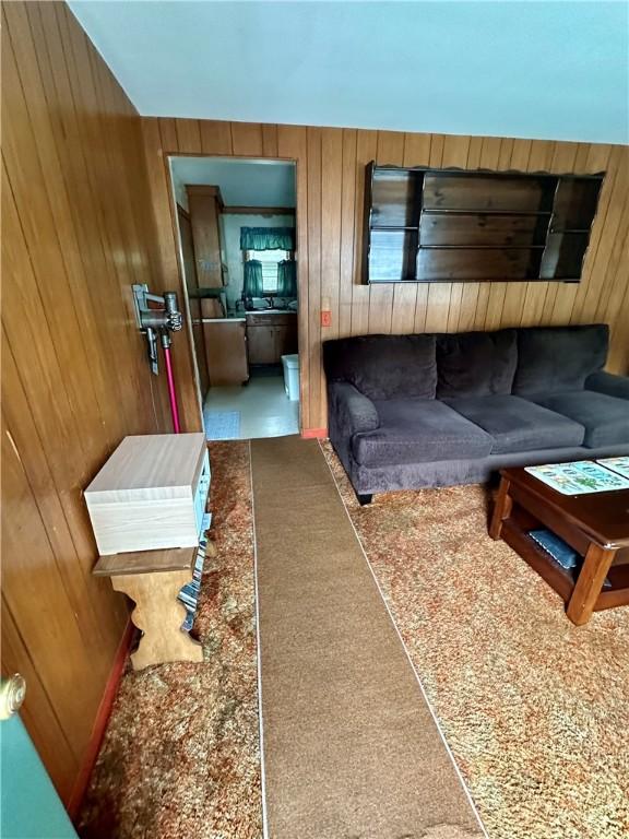 103 Windsor Park Dr, Coventry, RI 02816 - living room featuring wooden walls