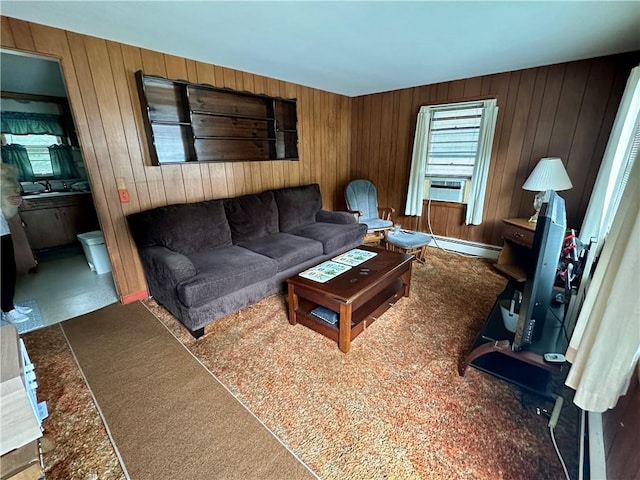 103 Windsor Park Dr, Coventry, RI 02816 - living room featuring cooling unit, wooden walls, and baseboard heating