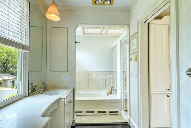 29 Orchard Ave, Providence, RI 02906 - bathroom featuring a garden tub, vanity, ornamental molding, and a shower with shower door