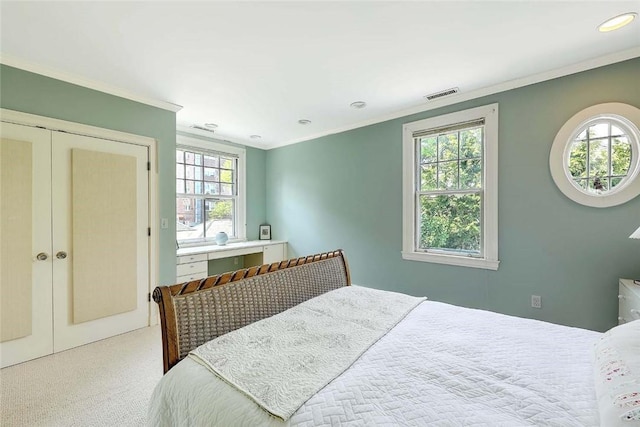29 Orchard Ave, Providence, RI 02906 - bedroom with crown molding, french doors, carpet, recessed lighting, and a closet