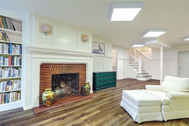 29 Orchard Ave, Providence, RI 02906 - living area with stairs, wood finished floors, and a fireplace