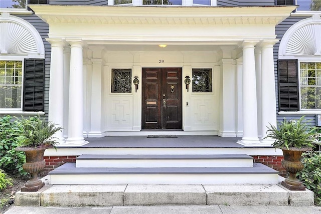 29 Orchard Ave, Providence, RI 02906 - view of exterior entry with a porch