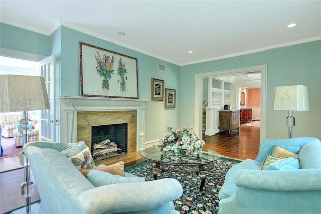 29 Orchard Ave, Providence, RI 02906 - living room featuring wood finished floors, ornamental molding, a high end fireplace, and recessed lighting