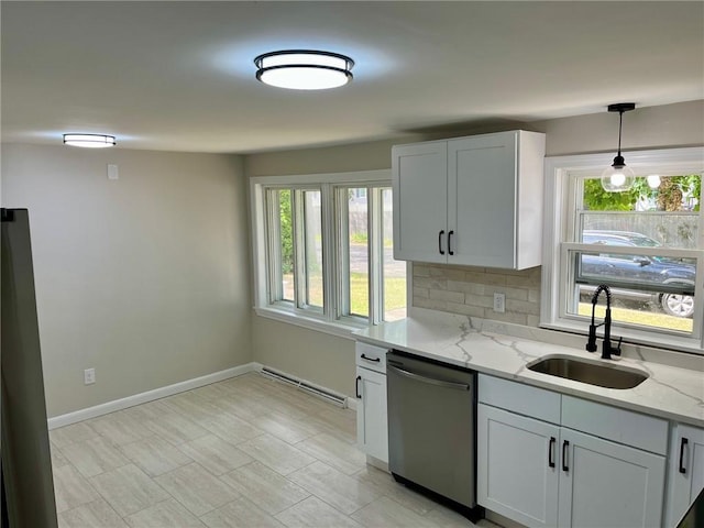 18 Louisiana Ave, Warwick, RI 02888 - kitchen with dishwasher, light stone counters, plenty of natural light, and hanging light fixtures