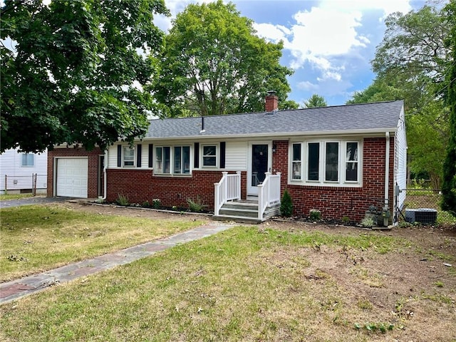 18 Louisiana Ave, Warwick, RI 02888 - ranch-style house featuring brick siding, a chimney, a garage, and asphalt driveway
