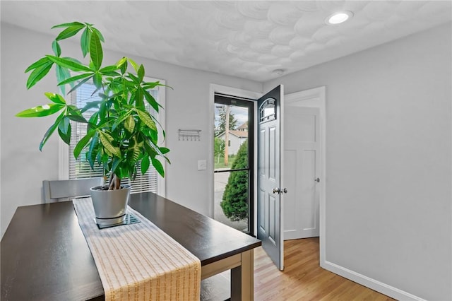 160 Coburn St, Warwick, RI 02889 - dining area featuring light wood finished floors and baseboards