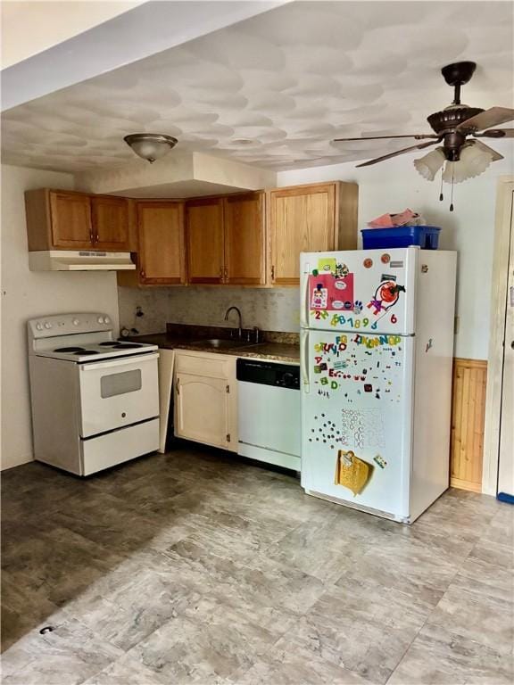 1190 Charles St Unit 9, North Providence, RI 02904 - kitchen with white appliances, under cabinet range hood, dark countertops, ceiling fan, and a wainscoted wall