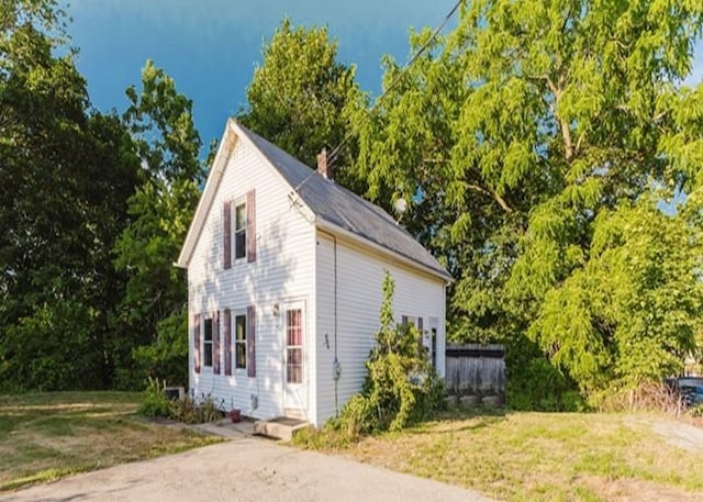 15 Hope Ct, West Warwick, RI 02893 - view of side of property featuring a lawn