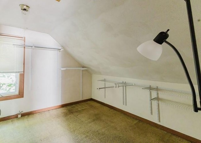 15 Hope Ct, West Warwick, RI 02893 - additional living space with vaulted ceiling and carpet floors