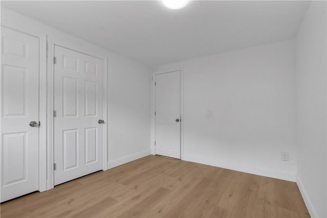 15 Maplewood Ave, Warwick, RI 02889 - unfurnished bedroom featuring light wood-style flooring and baseboards
