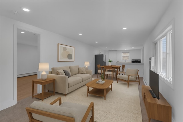 15 Maplewood Ave, Warwick, RI 02889 - living room with a baseboard radiator and recessed lighting