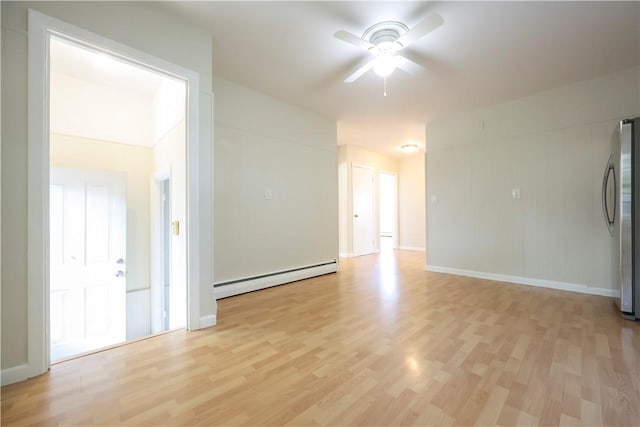 83 Vincent Ave, North Providence, RI 02904 - empty room featuring a baseboard heating unit, a ceiling fan, and light wood finished floors