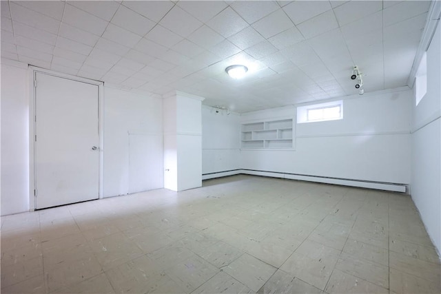 83 Vincent Ave, North Providence, RI 02904 - below grade area featuring a baseboard radiator and tile patterned floors