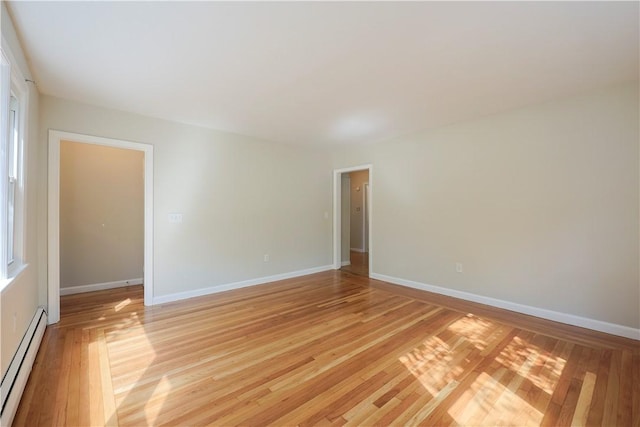 83 Vincent Ave, North Providence, RI 02904 - unfurnished room featuring baseboard heating and light wood finished floors