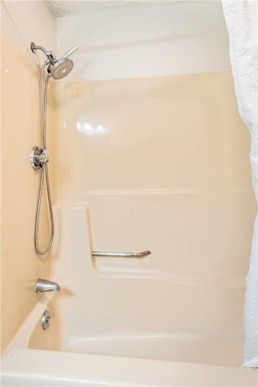 10 E St Unit 207, Cranston, RI 02920 - bathroom featuring shower / bath combo with shower curtain