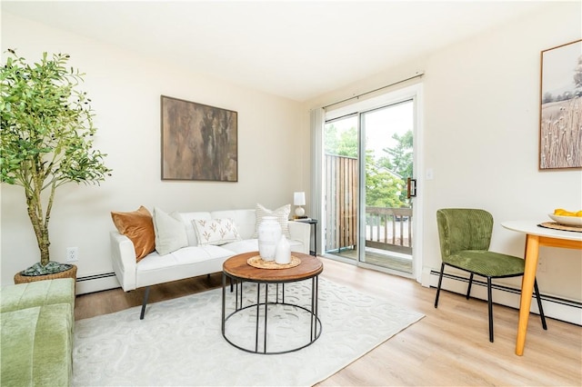 10 E St Unit 207, Cranston, RI 02920 - living room with a baseboard radiator and light wood-style floors