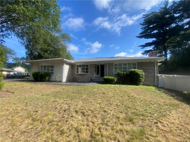109 Cobble Hill Rd, Lincoln, RI 02865 - ranch-style house with a chimney and stone siding
