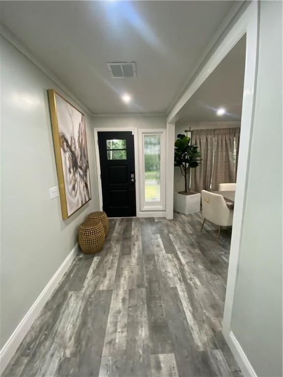 109 Cobble Hill Rd, Lincoln, RI 02865 - foyer entrance featuring wood finished floors and ornamental molding