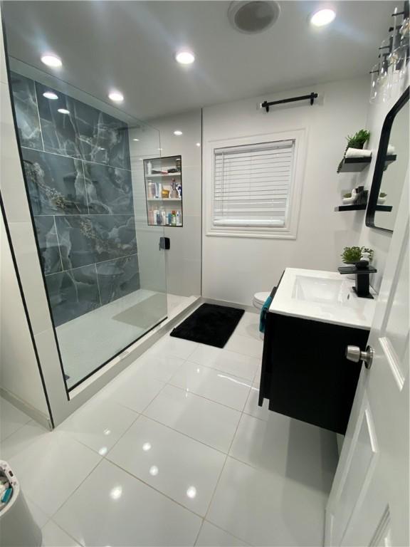 109 Cobble Hill Rd, Lincoln, RI 02865 - full bathroom with walk in shower, vanity, tile patterned flooring, and recessed lighting