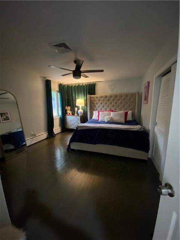 109 Cobble Hill Rd, Lincoln, RI 02865 - bedroom with dark wood-style flooring, a baseboard radiator, and ceiling fan